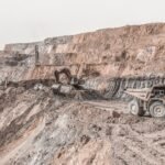 Large open pit copper mine with excavation machinery