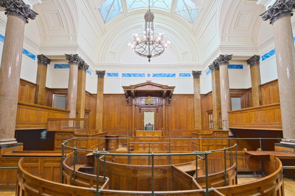 Interior view of the historic courtroom in St George's Hall, Liverpool, showcasing elegant architecture.
