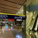 Modern airport terminal interior with natural light and architecture