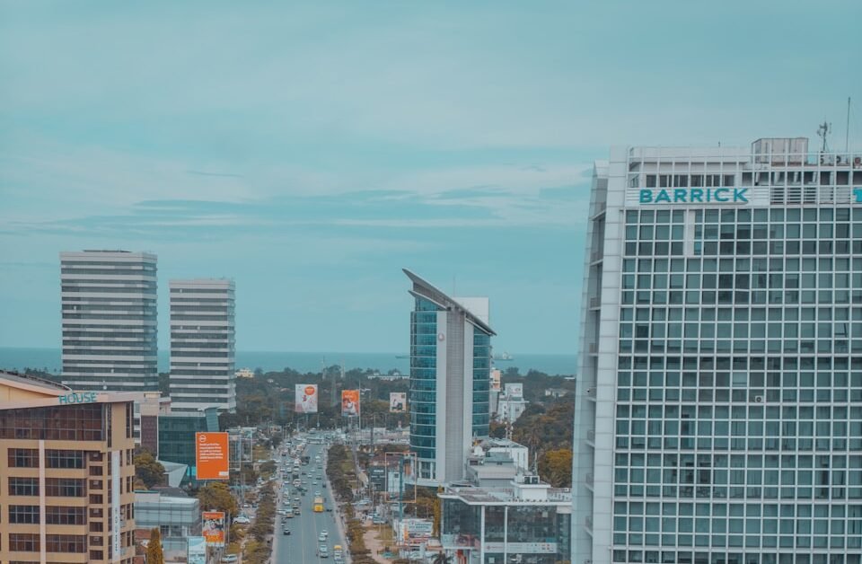 Tanzania's $15bn FDI gap is a readiness problem 1 cars on road near high rise buildings during daytime