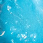 A detailed view of a vibrant blue textured abstract surface, capturing the essence of modern art.