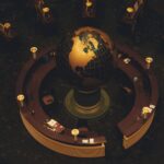 Aerial view of a glowing globe at a circular reception desk with ambient lighting.