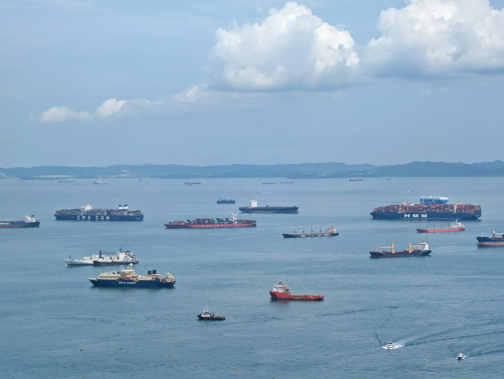 A large body of water filled with lots of boats