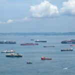 A large body of water filled with lots of boats