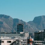 a city with mountains in the background