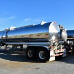 a large truck with a large tank on the back