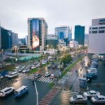 View of Addis Ababa's bustling streets and modern architecture on a rainy day.