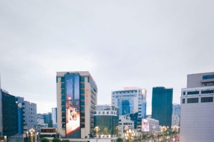 View of Addis Ababa's bustling streets and modern architecture on a rainy day.
