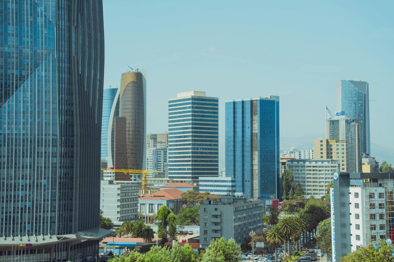 Explore the modern cityscape of Addis Ababa featuring towering skyscrapers and vibrant architecture.