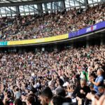 people at the bleachers of the stadium